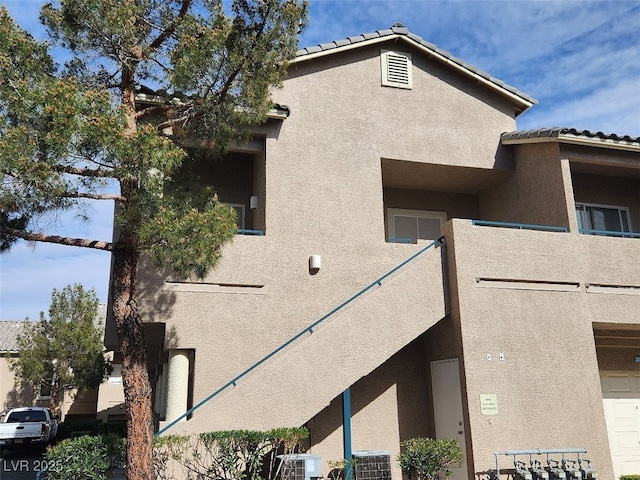 view of property exterior featuring ac unit