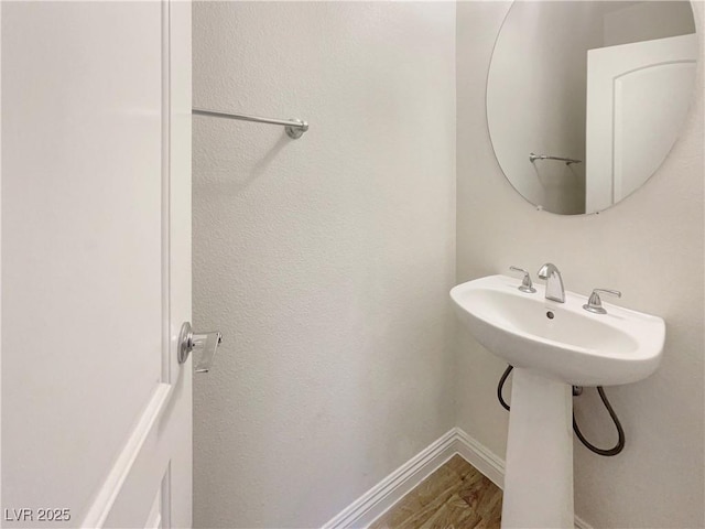 bathroom featuring hardwood / wood-style flooring