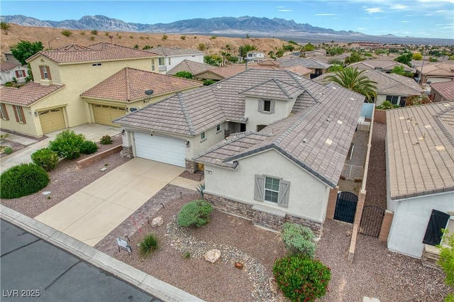 206 Pebble Creek Hts, Mesquite, NV 89027 - aerial view of residential area featuring a mountain backdrop