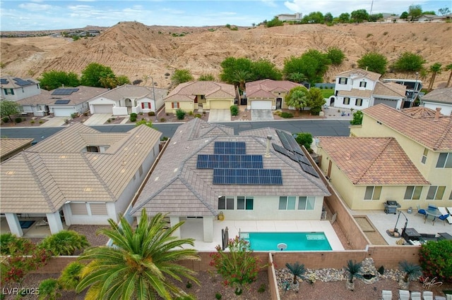 206 Pebble Creek Hts, Mesquite, NV 89027 - aerial perspective of suburban area featuring a pool and a mountainous background