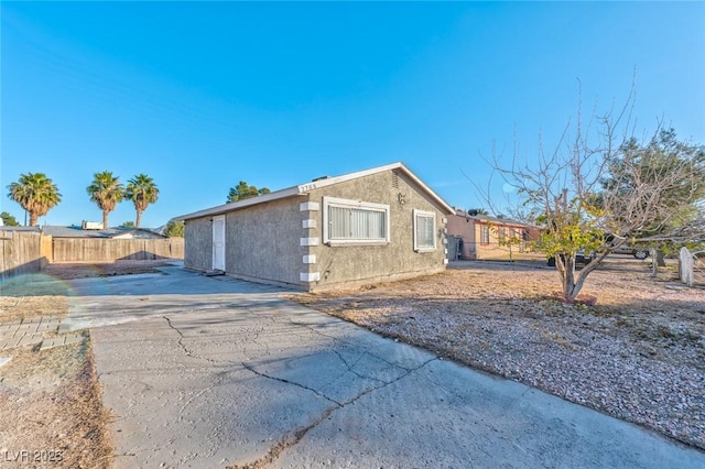 view of property exterior featuring a patio area