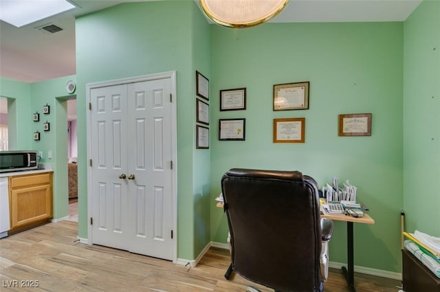 office area featuring light hardwood / wood-style floors