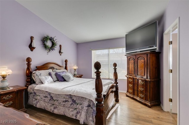 bedroom with light hardwood / wood-style flooring