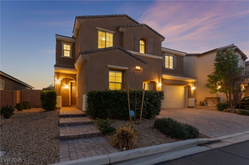 view of front of home with a garage