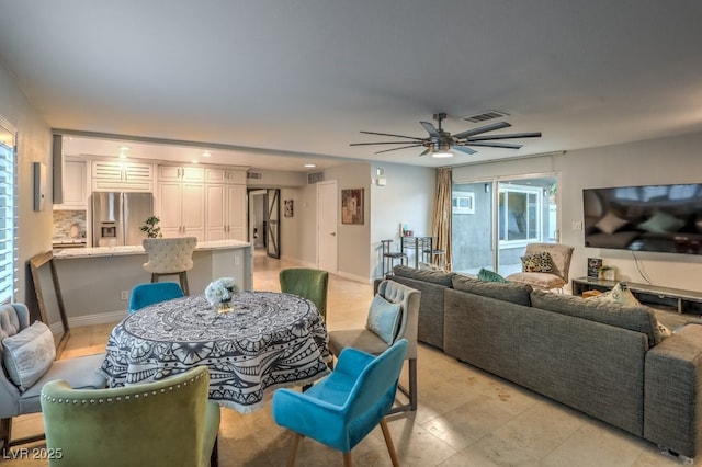 dining area with ceiling fan