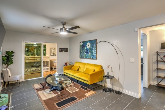 living room featuring ceiling fan