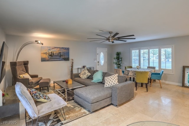 living room featuring ceiling fan