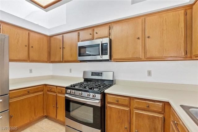 kitchen with sink and stainless steel appliances