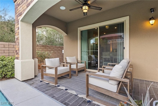 view of patio with ceiling fan