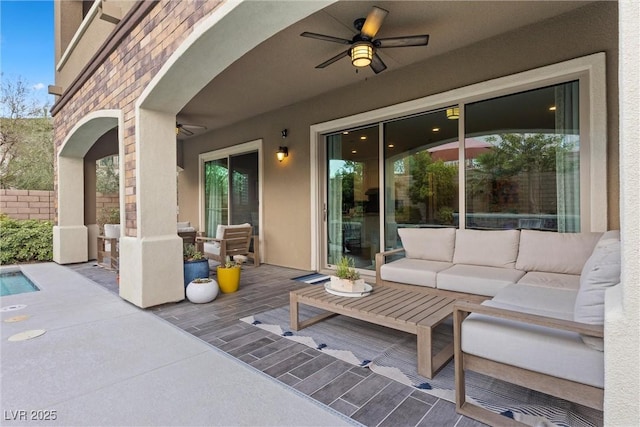 view of patio / terrace featuring an outdoor living space and ceiling fan