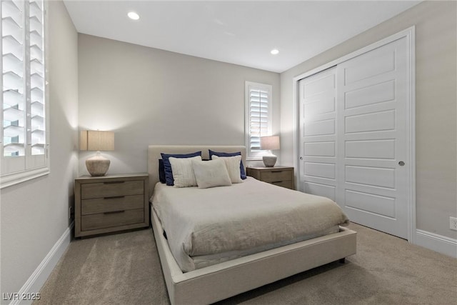 bedroom featuring a closet and carpet floors