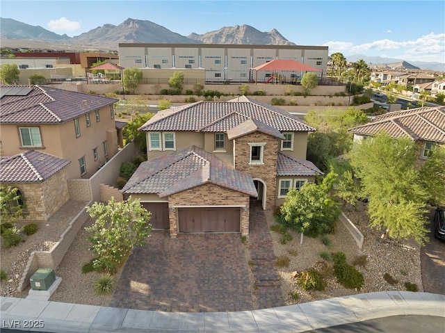 drone / aerial view featuring a mountain view