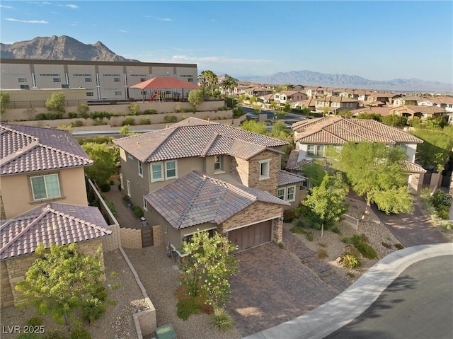 bird's eye view with a mountain view