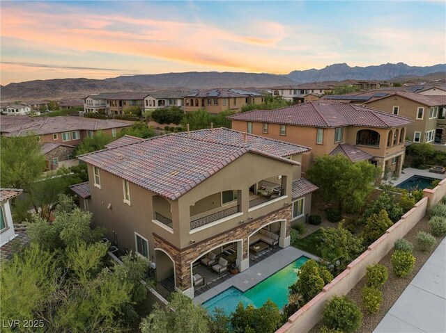 aerial view at dusk with a mountain view