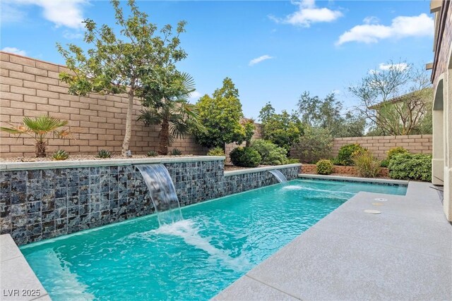 view of swimming pool featuring pool water feature