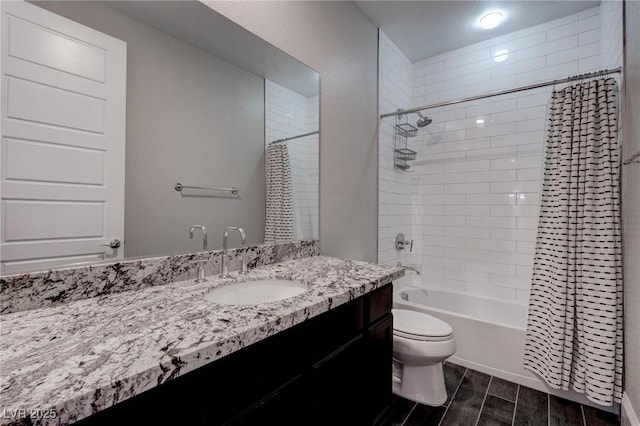 bathroom featuring shower / bath combination with curtain, wood finish floors, vanity, and toilet