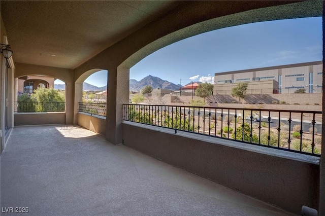 balcony featuring a mountain view