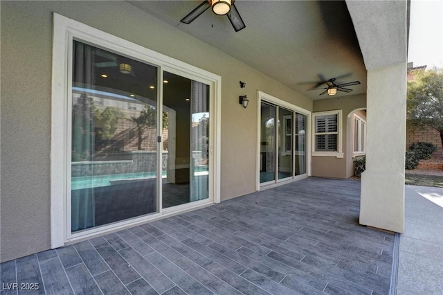 view of patio / terrace featuring ceiling fan