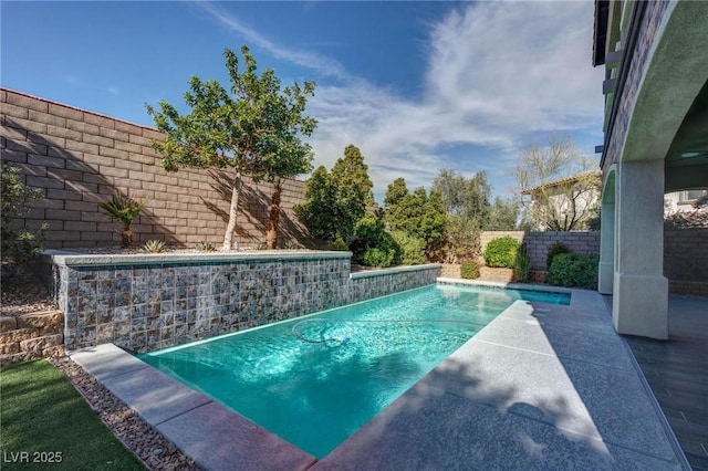 view of pool with a patio area, a fenced backyard, and a fenced in pool