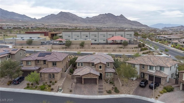 aerial view with a mountain view and a residential view