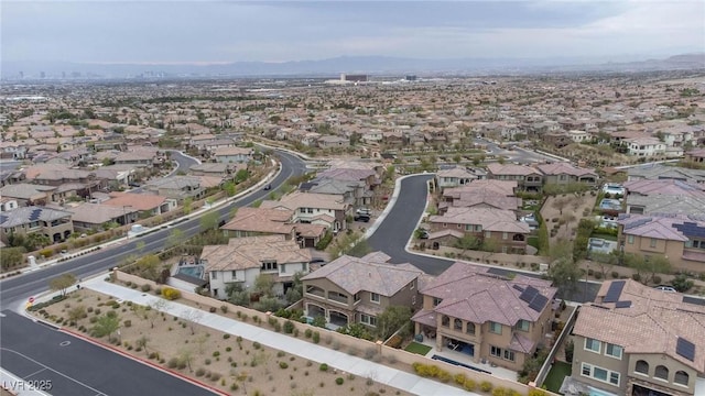 bird's eye view featuring a mountain view and a residential view