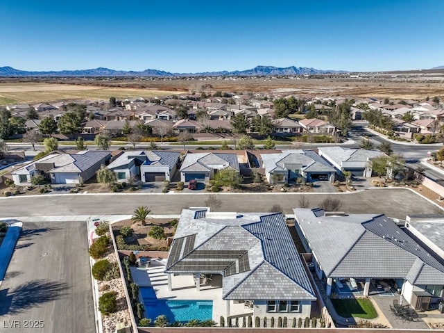 drone / aerial view featuring a mountain view