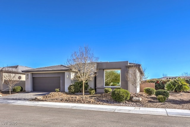 view of front of home with a garage