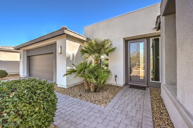 property entrance featuring a garage