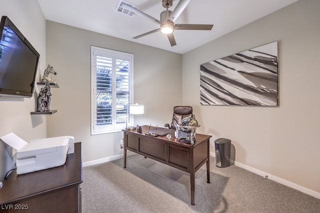 carpeted office space with ceiling fan