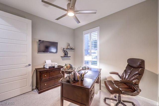 office with light carpet and ceiling fan