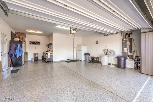 garage featuring white refrigerator, a garage door opener, and water heater