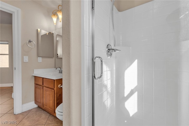 bathroom featuring vanity, tile patterned floors, and walk in shower