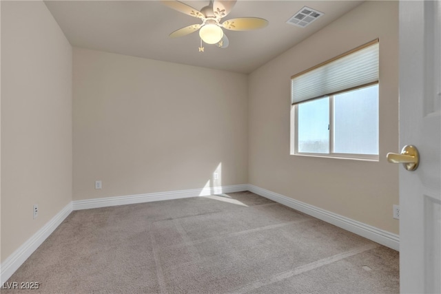 carpeted empty room with ceiling fan