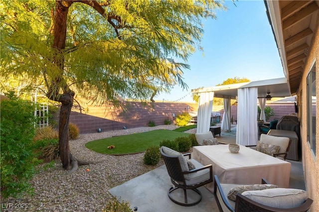 view of patio / terrace with ceiling fan