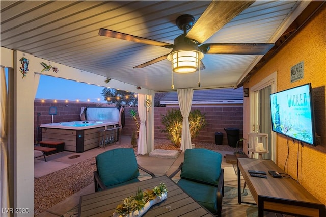 view of patio with ceiling fan