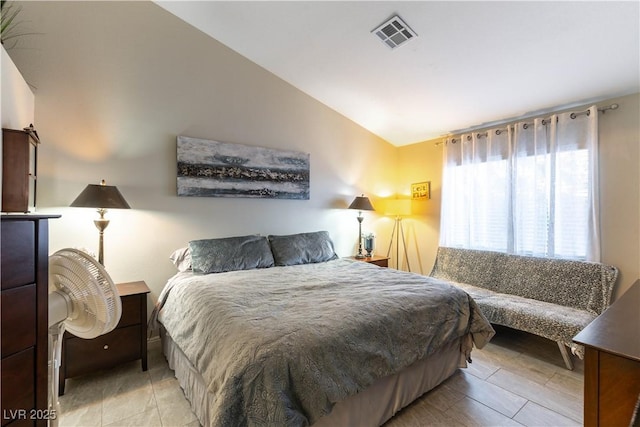 bedroom with vaulted ceiling