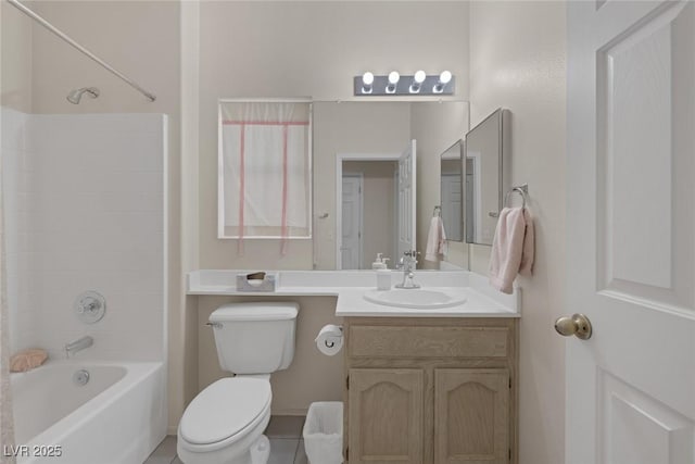 full bathroom featuring tile patterned floors, vanity, toilet, and shower / tub combination