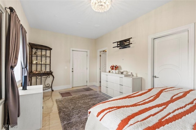 bedroom featuring a chandelier