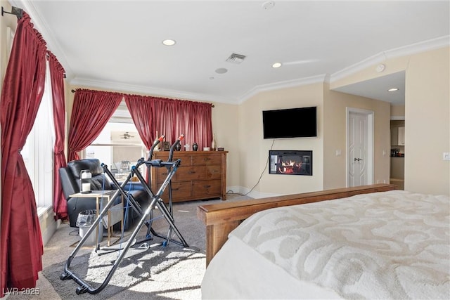 bedroom featuring light colored carpet and ornamental molding