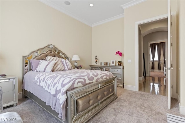 carpeted bedroom with crown molding