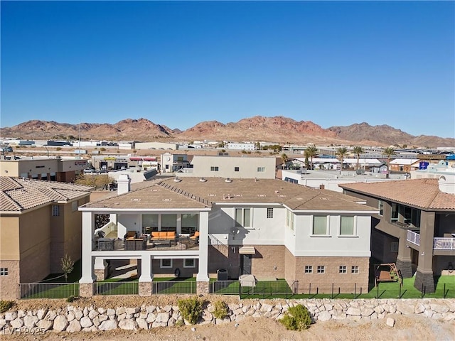 exterior space featuring a mountain view