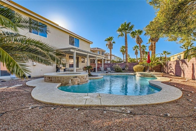 view of pool with an in ground hot tub, a patio area, pool water feature, and a pergola