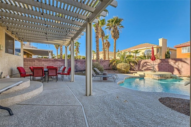 view of swimming pool featuring pool water feature, a pergola, a patio area, and a jacuzzi