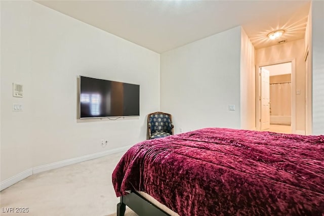 carpeted bedroom with vaulted ceiling