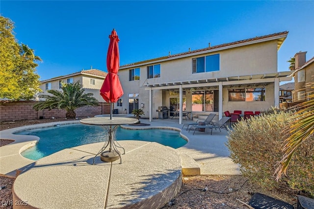 view of swimming pool with a pergola and a patio