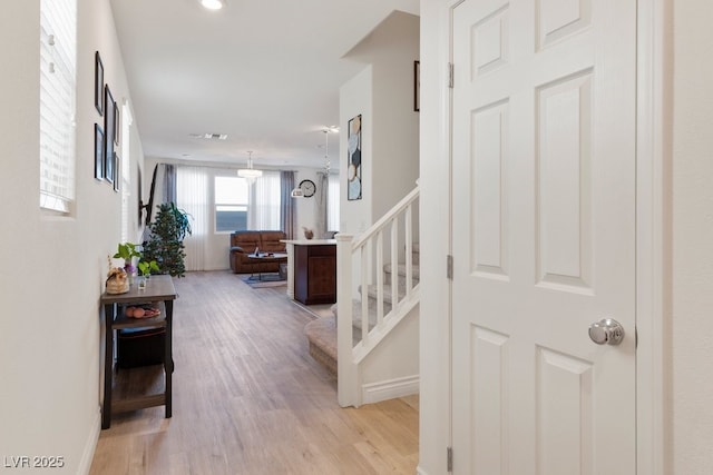 hallway featuring light hardwood / wood-style floors