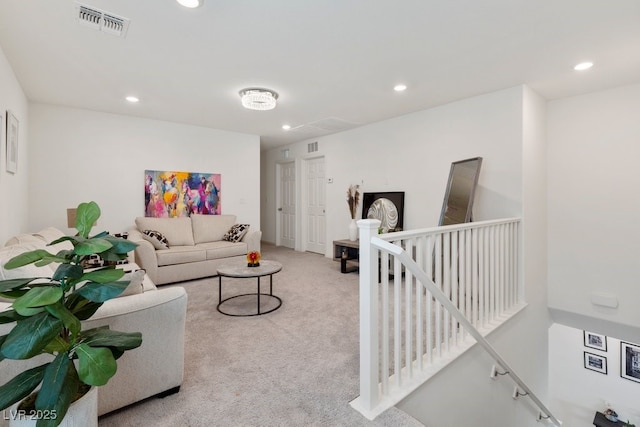 living room with light colored carpet