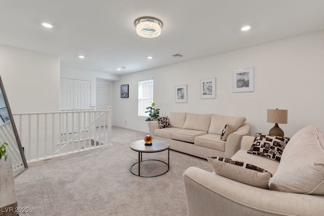 living room with light colored carpet