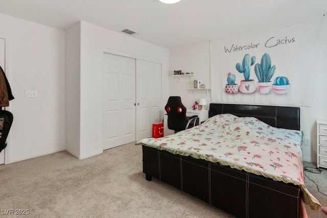 bedroom with carpet and a closet