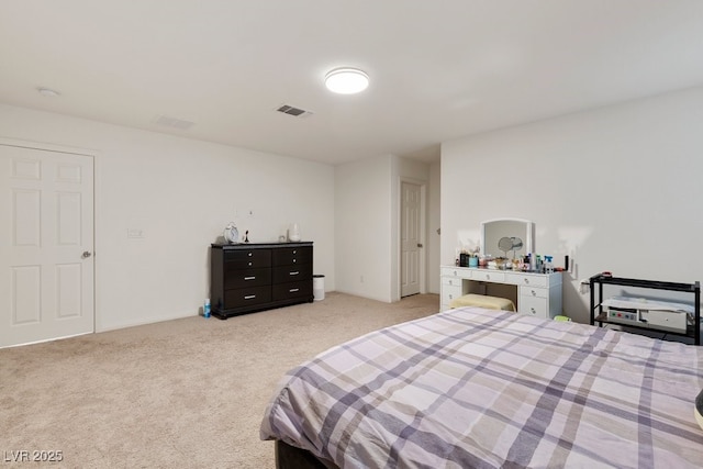 bedroom with light carpet